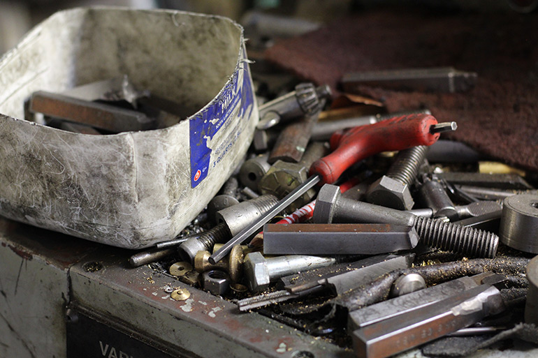 Pile of metal and tools at Anderson Tooling
