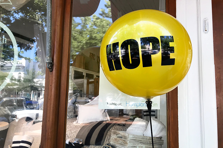 Week of Hope yellow balloon in front of Hildreth's in Southampton