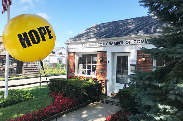 Week of Hope yellow balloon in front of the Southampton Chamber of Commerce