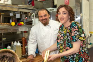 Chef Arie Pavlou with Dan's Hamptons Senior Editor and cookbook author Stacy Dermont slice up bamboo