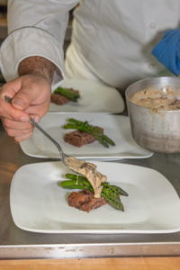 The opening course, Olive Bread, Local Asparagus & Chef Foraged Wild Pheasant Back Mushroom