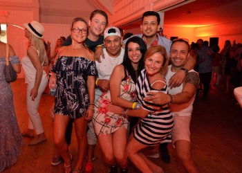 Guests dancing to the music of El Media DJ at the VIP After Party