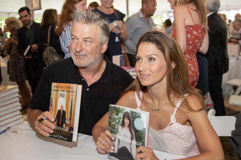 Alec and Hilaria Baldwin with their books