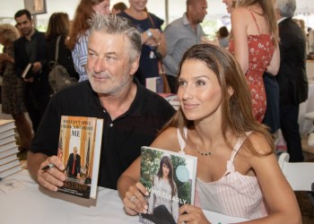 Alec and Hilaria Baldwin with their books
