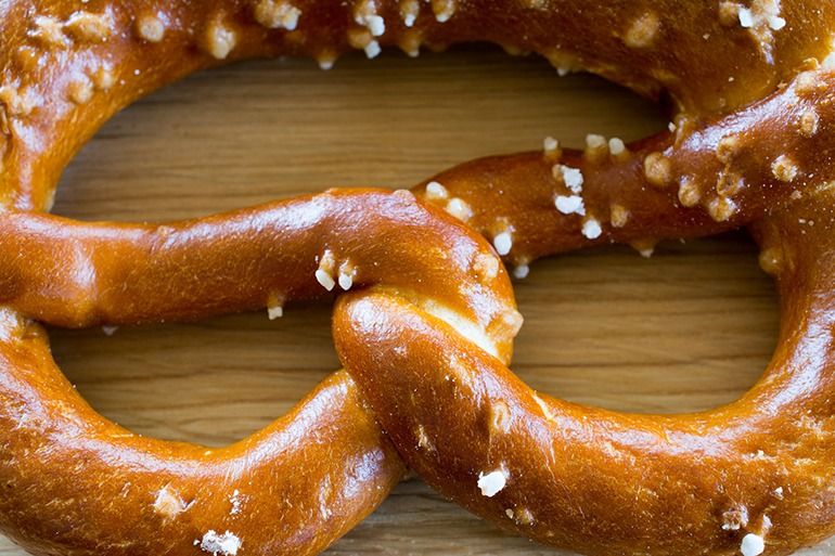 78756120 - salted pretzel closeup. shallow depth of field.