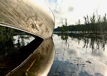 Canoe reflected on water by Joe Pallister (DesigningJoe)