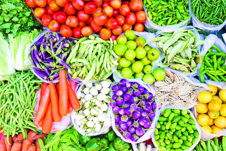 44288321 - farmers market with various domestic colorful fresh fruits and vegetable. tasty colorful mix.