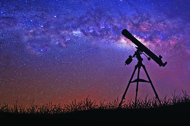 50395182 - infinite space background with silhouette of telescope.