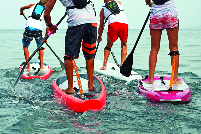 85006853 - stand up paddle group on the sea