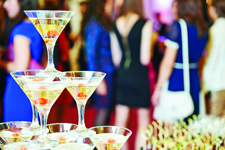 50038125 - champagne pyramid with waitress on event, party or wedding banquet reception