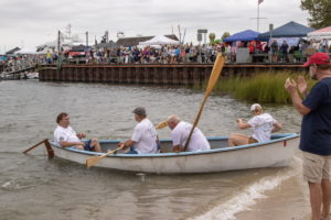 Spectators lined up to cheer on their favorite team during the Whalers Cup race