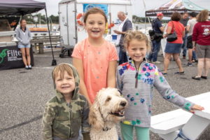 Dash, age 4, Khloe, age 9, and Lola, age 8, enjoyed a day out with their fur baby Chester, also age 4 (that's 28 in dog years)