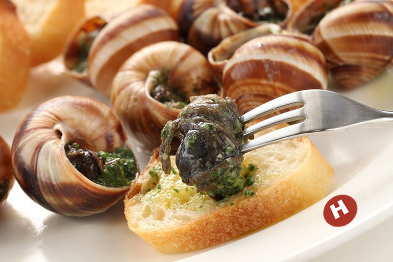 Hamptons Subway Escargot on fork and plate