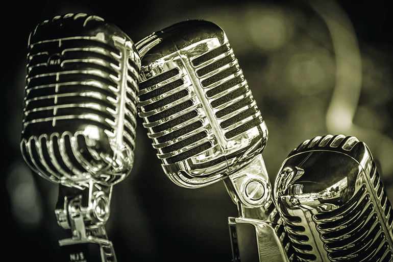 46481736 - closeup of chromed retro recording studio microphones