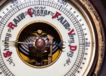 Vintage barometer forecasting stormy weather ahead