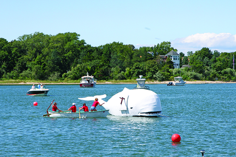 Harpooning the whale at the 2017 Harborfest whaleboat races, Photo: Barbara Lassen