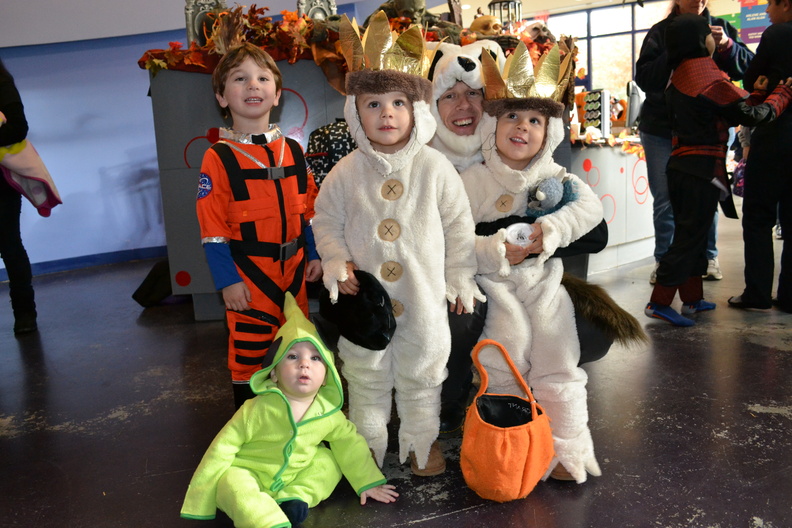CMEE president, Steve Long giving Panda hugs to sons, Grant, 2, and Bennett, 4, both as Max from 'Where The Wild Things Are' along with 9-month Alien Abram and his brother Benjamin the Astronaut