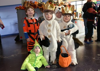 CMEE president, Steve Long giving Panda hugs to sons, Grant, 2, and Bennett, 4, both as Max from 'Where The Wild Things Are' along with 9-month Alien Abram and his brother Benjamin the Astronaut