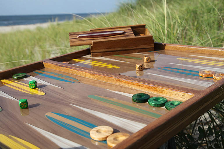 "Big Sur" backgammon table by Studio Jean-Michel on the beach