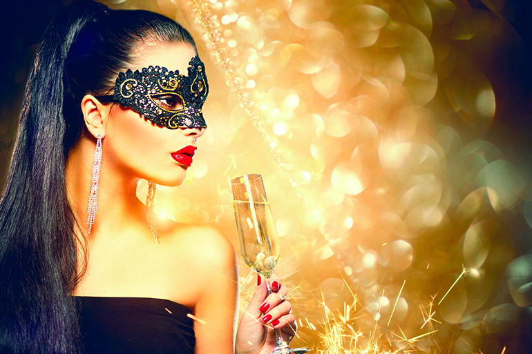 49636694 - sexy model woman with glass of champagne wearing venetian masquerade mask at party