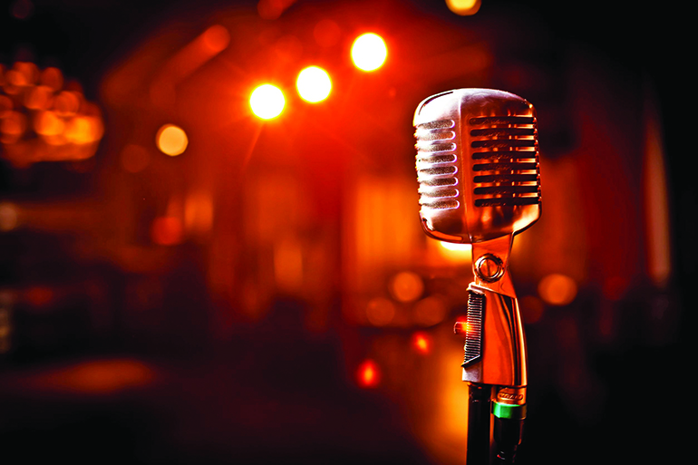 12124461 - retro microphone on stage