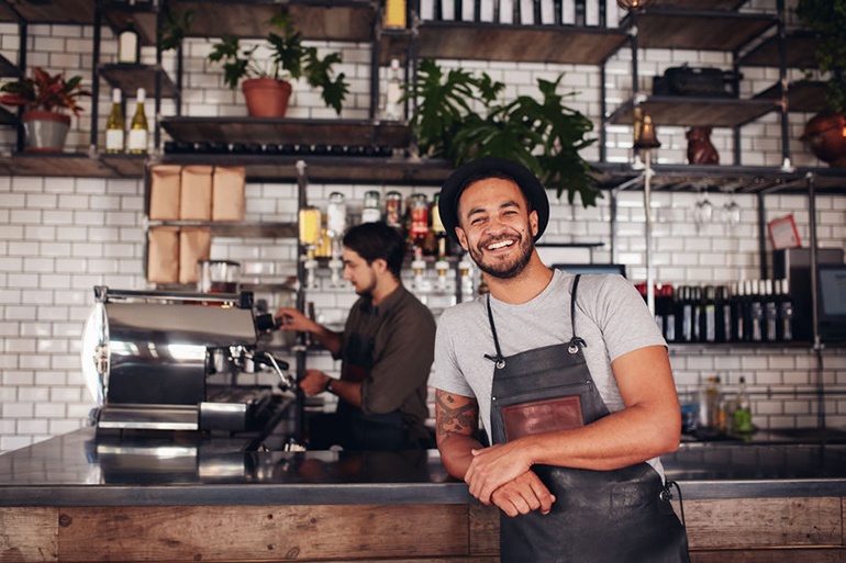 Restaurant coffee shop owner in front of counter