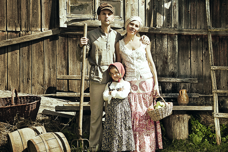 Retro styled family portrait. Monochrome, grunge textures, intentional styled to the 1900's.
