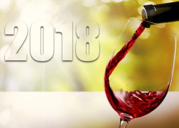 2018 wine moments - red wine pouring in glass with 2018 behind it