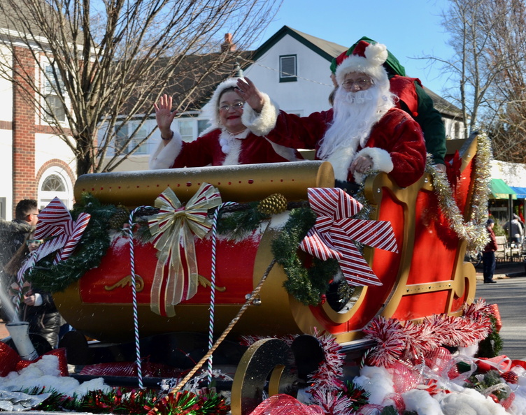 Mrs. Claus, Juliette Parker, Board of Directors Kiwanis with Dan Rattiner as Santa , the main attractions for the Santa Parade