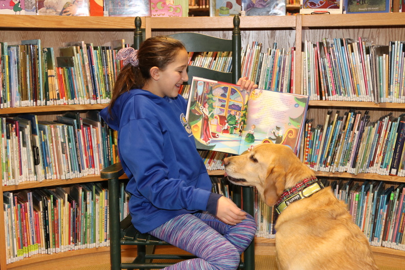 Isabelle reads to Wally