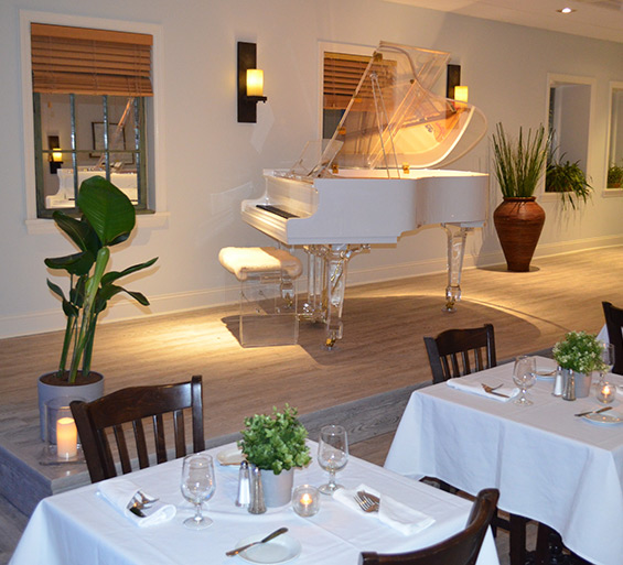 Claude's has its own grand piano for entertaining