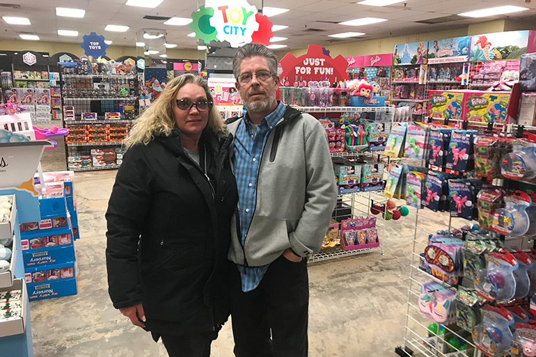 John and Stacey Walsh at Toy City in Riverhead