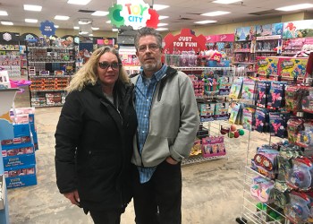 John and Stacey Walsh at Toy City in Riverhead