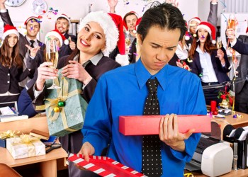 Guy disappointed with Yankee Swap gift at office Christmas party