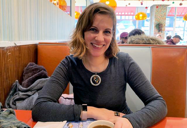  "I Think I'll Make It" writer-director Dara Bratt sitting at a table in a diner