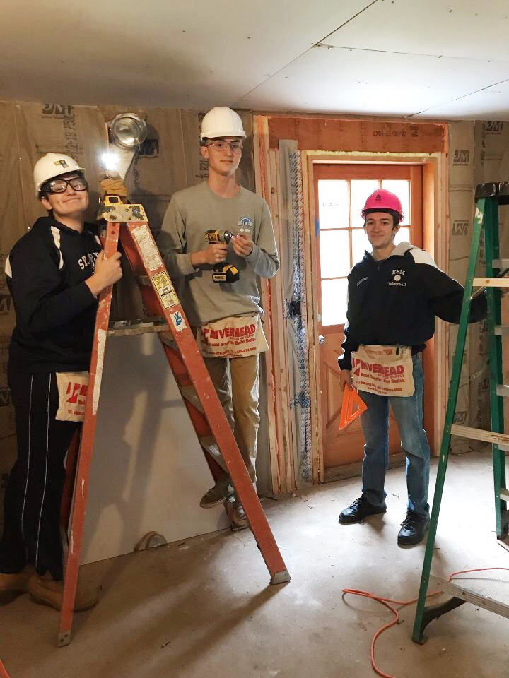 ESM volleyball players help Habitat for Humanity
