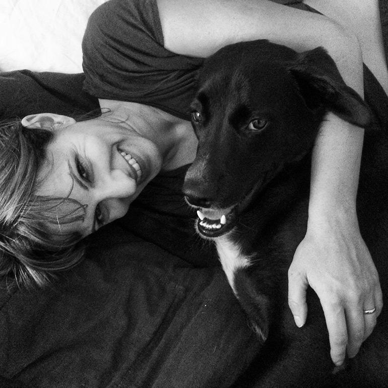 Dara Bratt with her black dog Zeppelin