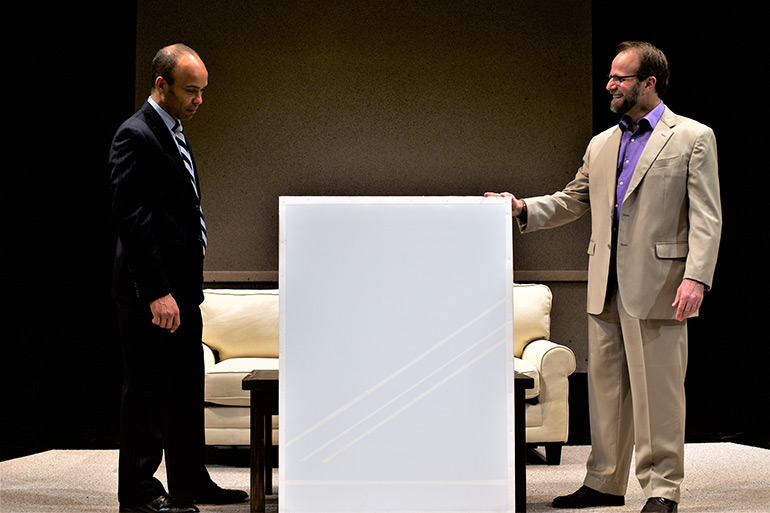 Antoine Jones and Steve Ayle with the white painting in Theatre Three's play "Art"