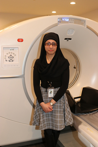 Ana Pakal, NYCBS Radiology Manager, in front of the new PET/CT scanner, Photo: Barbara Lassen