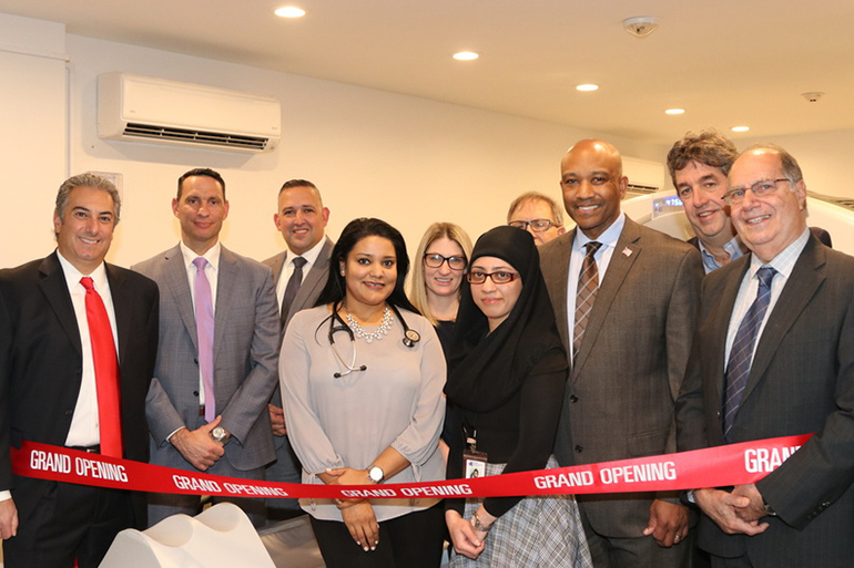 (L to R) Dominick Scarglato, Anthony Tirino and Angel Salcedo of GE Healthcare; Dr. Deepali Sharma; Dr. Kelly Miller; Radiology Manager Ana Pakal; Dr. Louis Avvento; Suffolk County Sheriff Errol Toulon Jr.; Southampton Town Attorney James Burke; and Congressional Aide Ben Monachino. Photo: Barbara Lassen