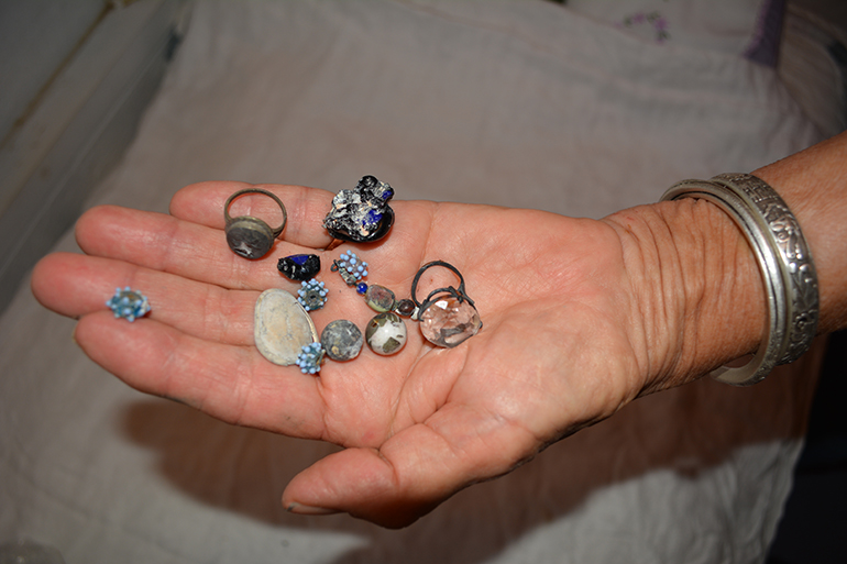Jeanelle Myers with treasured relics in-hand, Photo: Stacy Dermont