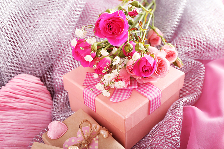 Handmade gifts on Valentine Day, on fabric background