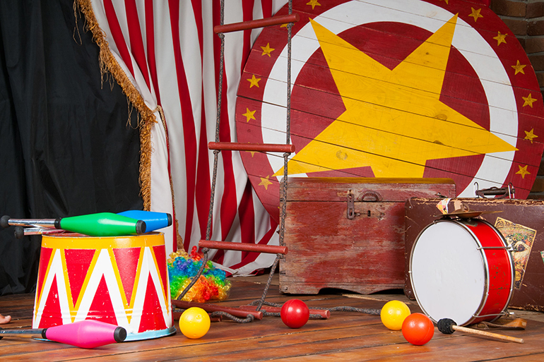 Circus backstage in retro style, drum suitcase. Interior