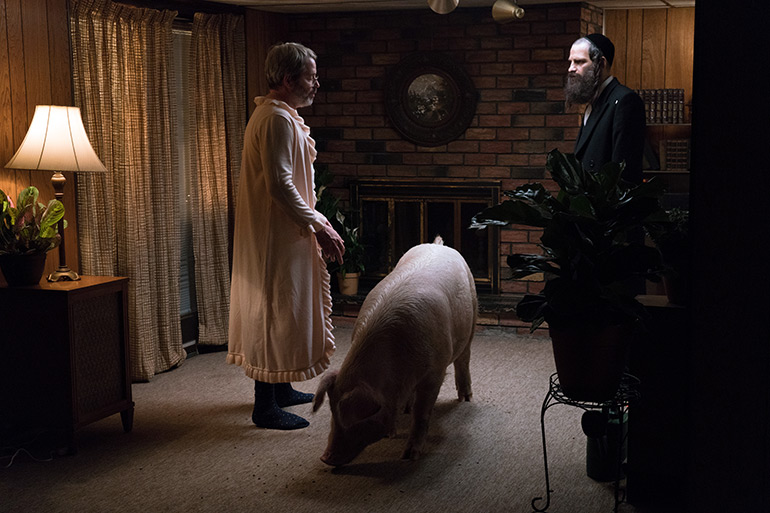 Matthew Broderick's Albert wearing his wife's nightgown with a pig and Géza Röhrig as Shmuel in "To Dust"