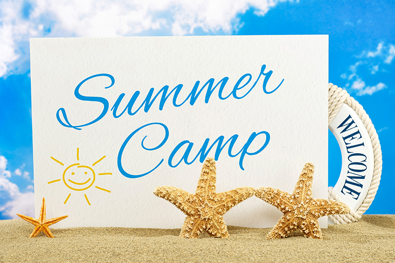 Summer camp banner on the beach