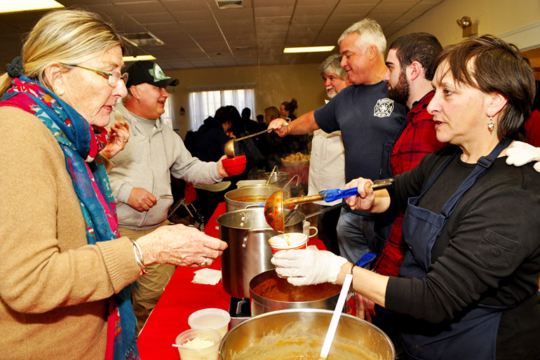 Jenny Ellis serving soup at the Empty Bowls benefit, Photo: Gianna Volpe