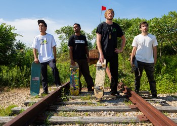Tohmi Shiroyama, Bartholomew Schwarz, Pat Lane and Lenny Giannantoni at the end of railroad tracks in Montauk with skateboards