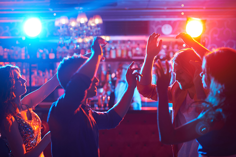 Young people dancing at a nightclub