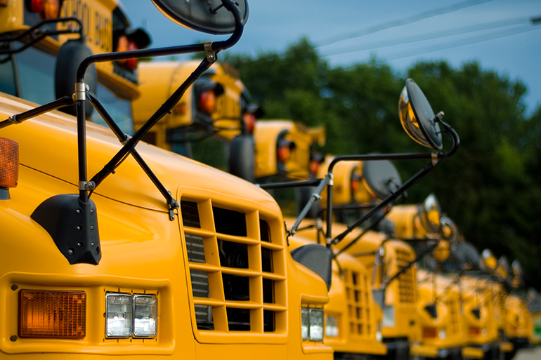 Fleet of school busses - a bus driver allegedly drove drunk and left the scene of two crashes