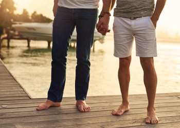 Cropped shot of an unrecognizable couple spending the day by the beach